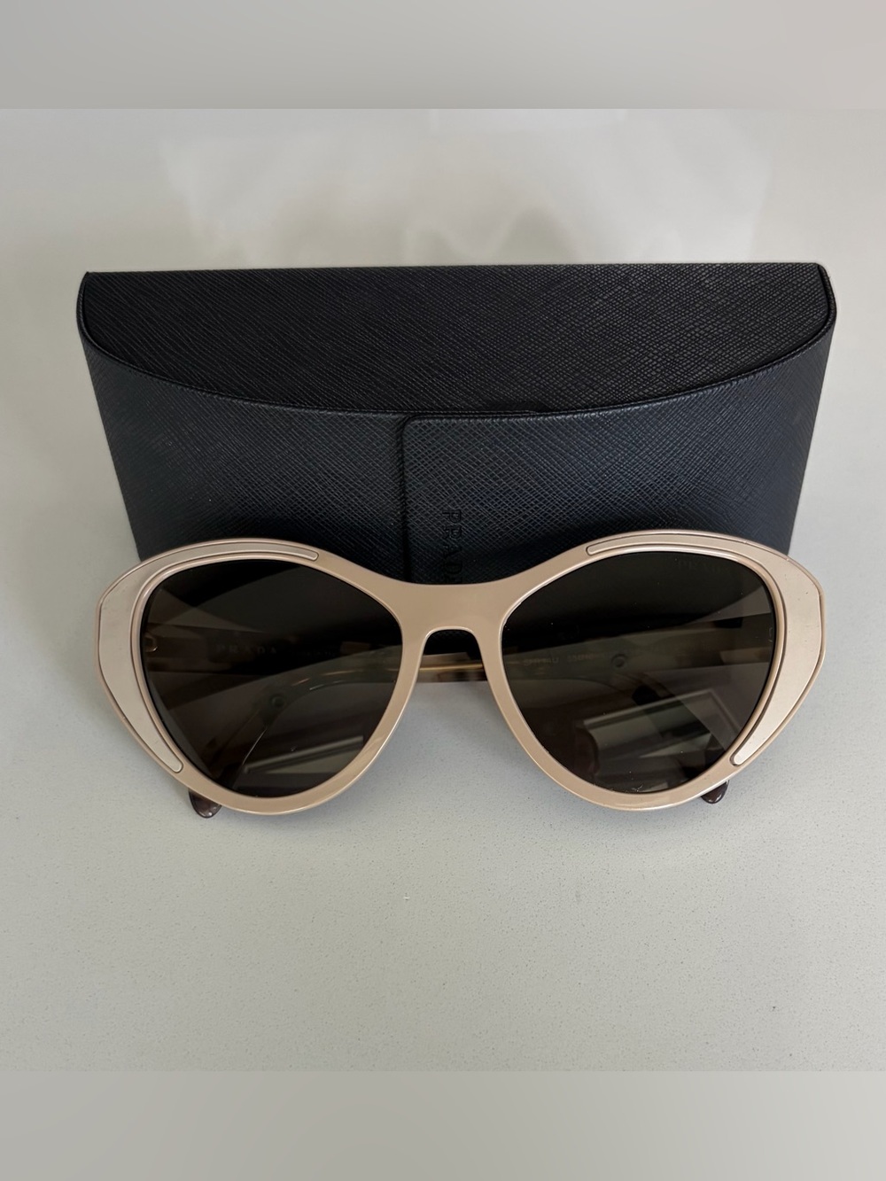 Prada Women's Cat-Eye Sunglasses in Beige Frame with Dark Lenses